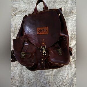 Gifted & Co. Premium leather backpack purse.